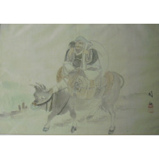 Man riding buffalo.