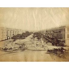 Laying stones in Place de Consuls, Alexandria, with figures and carriages.