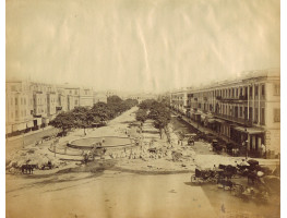 Laying stones in Place de Consuls, Alexandria, with figures and carriages.