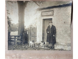 'W.H. Patterson with terriers Jack & ? Twile', outside Knocknoney National School taken by Robert M. Patterson, his son.