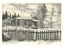 'Out of the Past' Log Cabin with mountains in background, fence in foreground.